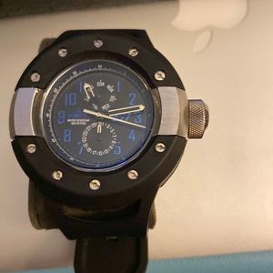 Invicta S7 watch black band with a blue face